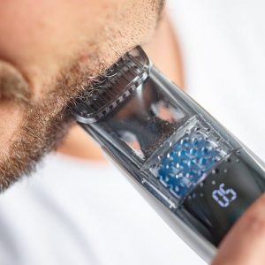 máquina de afeitar con aspiración de pelos moderna